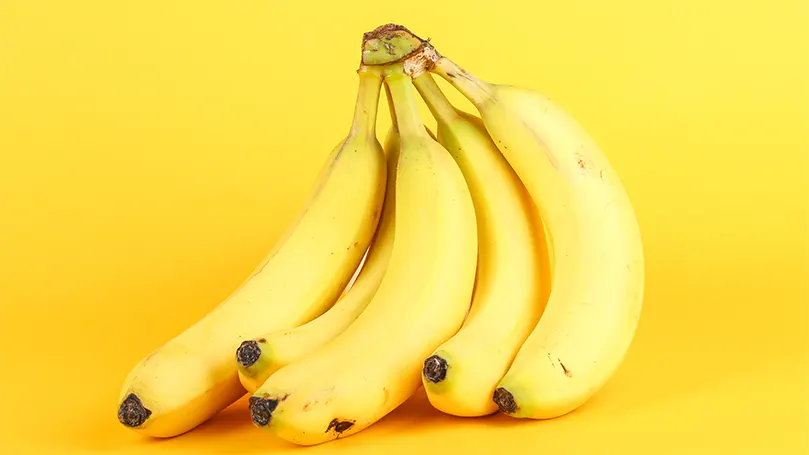 Uma imagem de um cacho de bananas