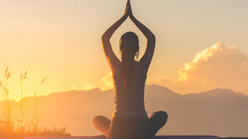 a woman doing yoga