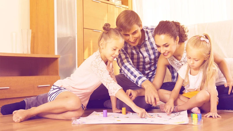 an image of a man playing board games before bed time