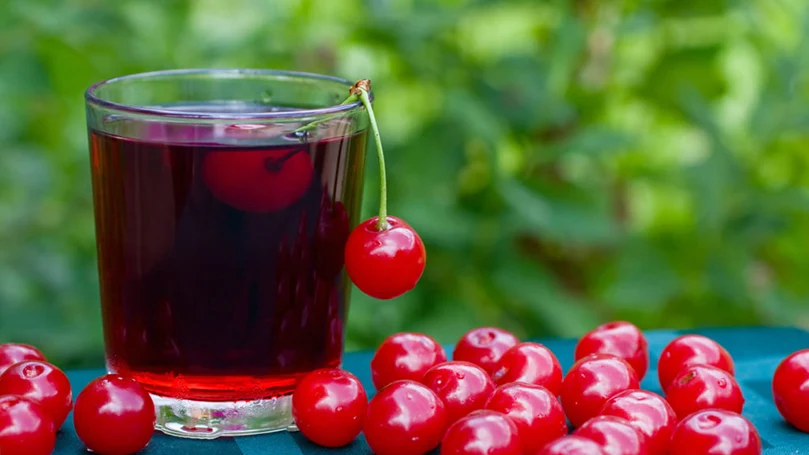 an image of a glass of cherry juice