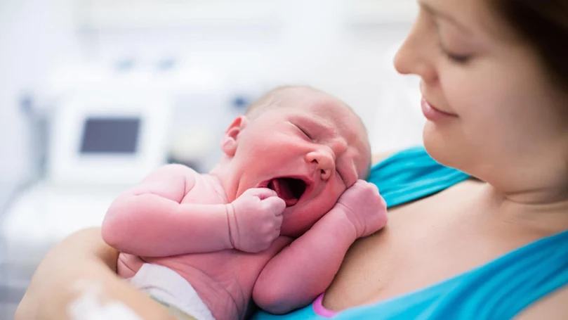 an image of a woman dreaming of giving birth to a baby