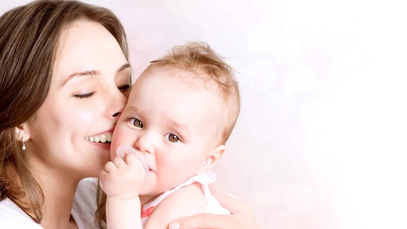 an image of a happy mom with a happy baby