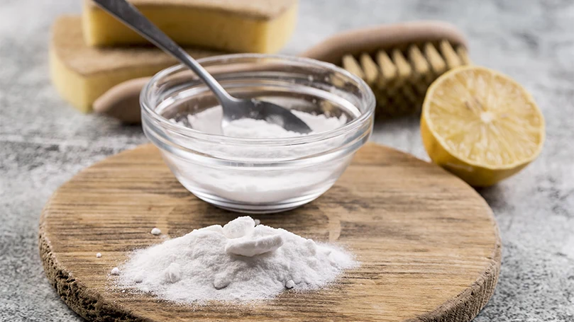 a baking soda powder in a small glass pot