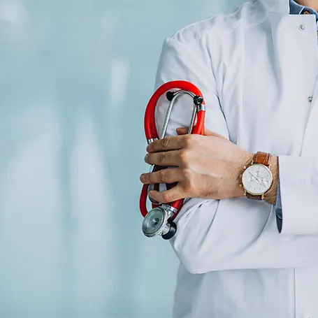 doctor holding stethoscope