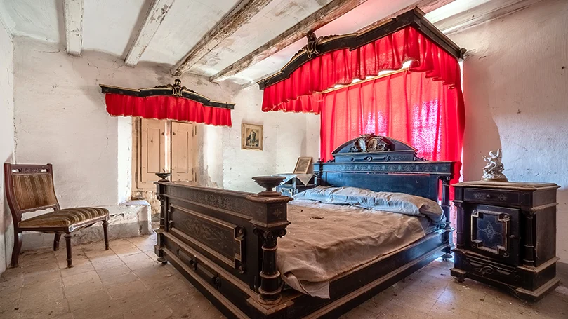 Uma imagem do quarto de dormir da Roma Antiga.