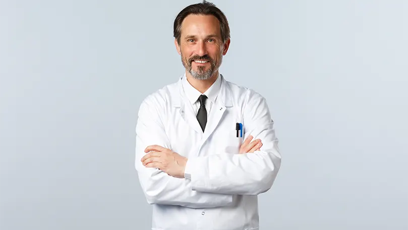 A doctor in a white coat.