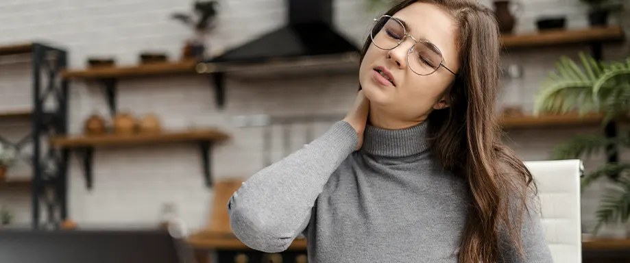 Woman with pain in the neck