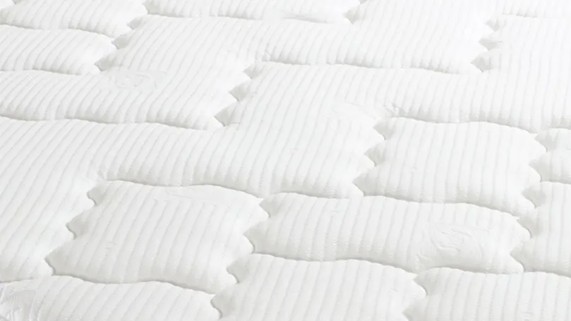 Uma imagem de grande plano da capa do colchão Sealy Posturepedic Pearl Luxury Pillow Top.