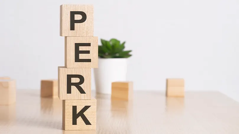 An image of wooden blocks with the word perk spelled out