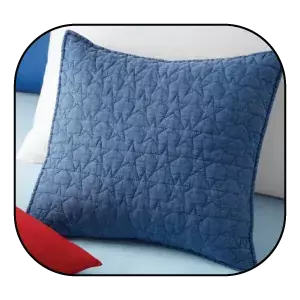 Uma imagem da almofada Quilted Star da Dunelm.