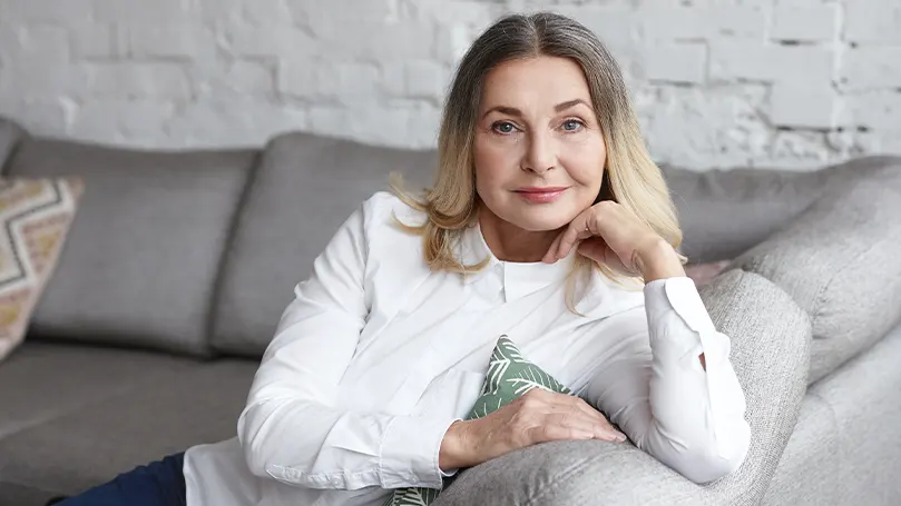 A woman sitting on a couch