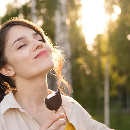 An image of a woman smiling.